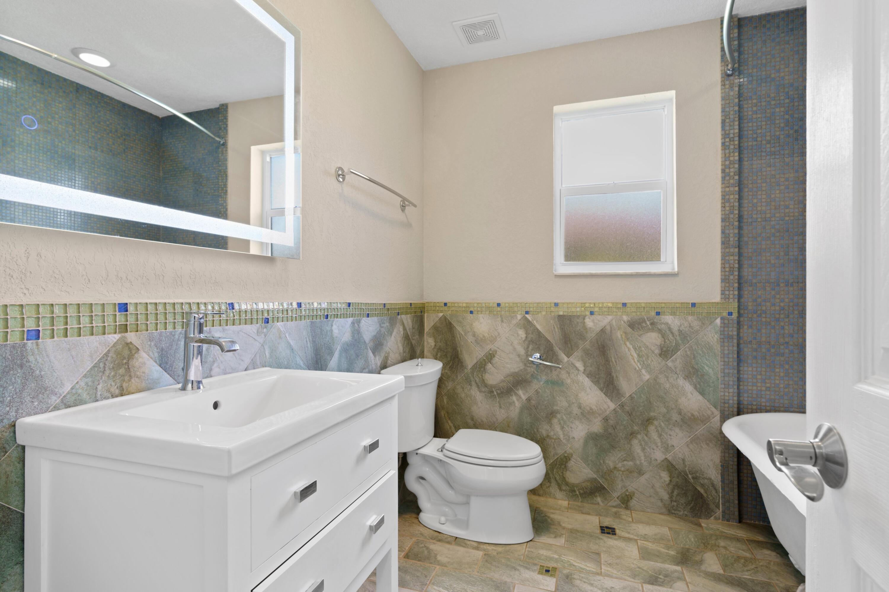 4545 Brandywine Drive Boca Raton, FL 33487 - Photo 16 of 32 Bathroom 2
