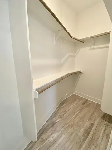 a view of an empty walk in closet