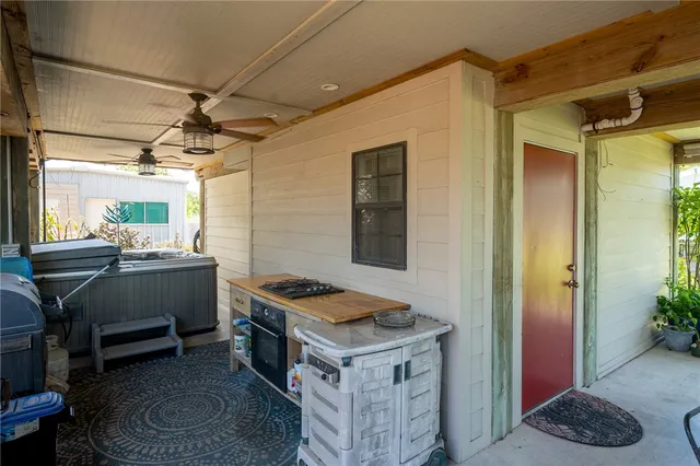 a kitchen with a stove and a refrigerator