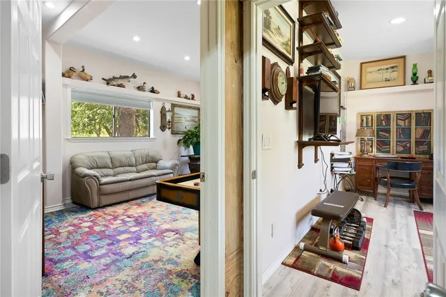 a living room with furniture and a rug
