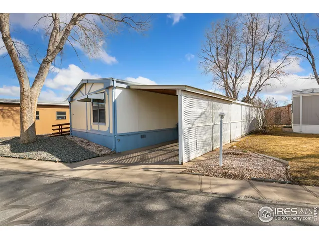 a view of a backyard of the house