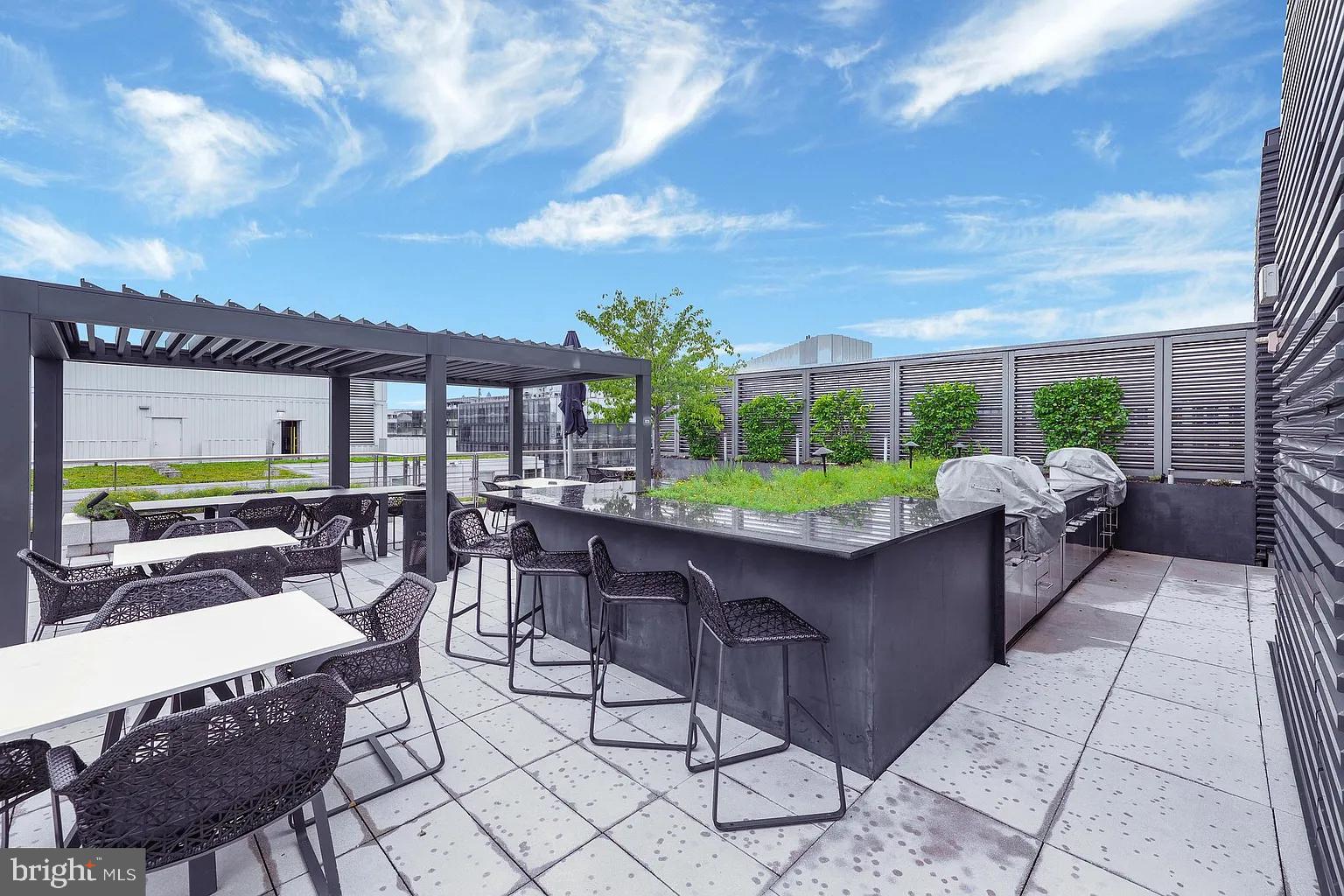 920 I Street Northwest, Unit 704 Washington, DC 20001 - Photo 22 of 24 a view of outdoor space yard and patio