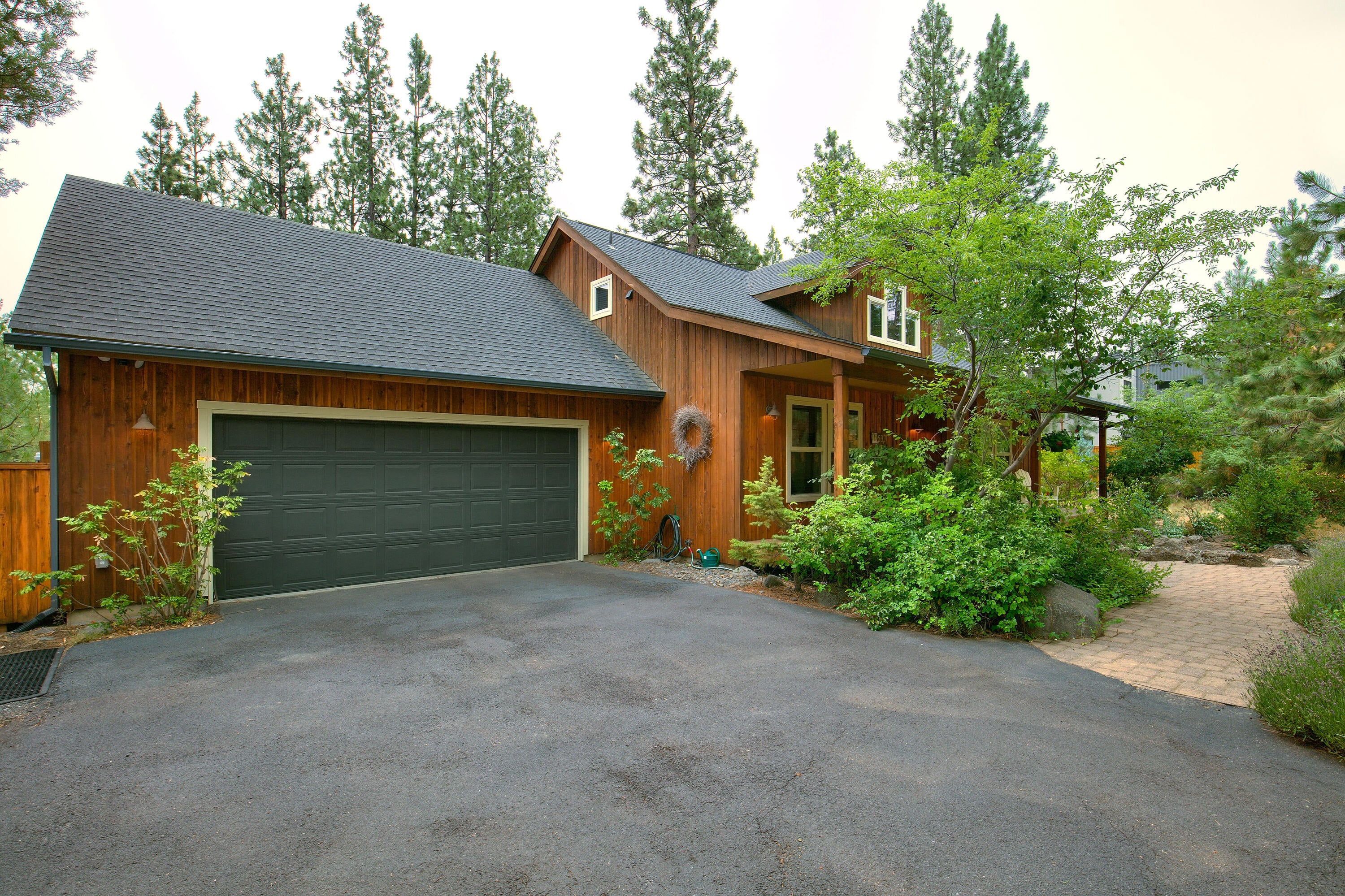 19537 East Campbell Road Bend, OR 97702 - Photo 2 of 29 Large 2 car garage w/ storage shelving, ductless a/c & heat. RV parking to the left (not pictured)