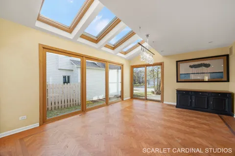 a view of an empty room and a window