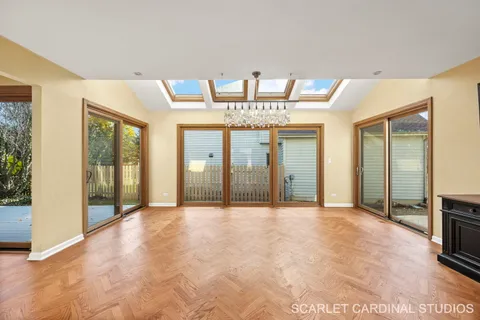 a view of an empty room with a fireplace