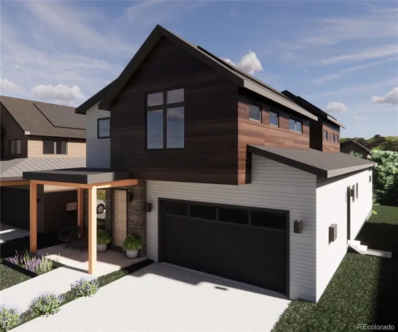 a front view of a house with glass windows