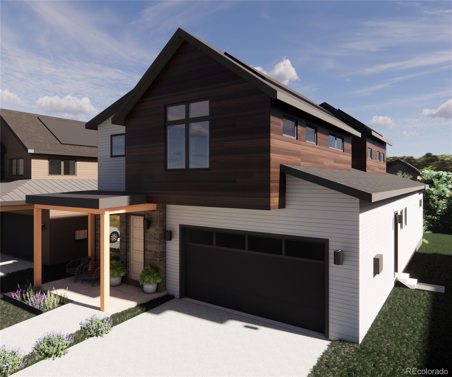 a front view of a house with glass windows