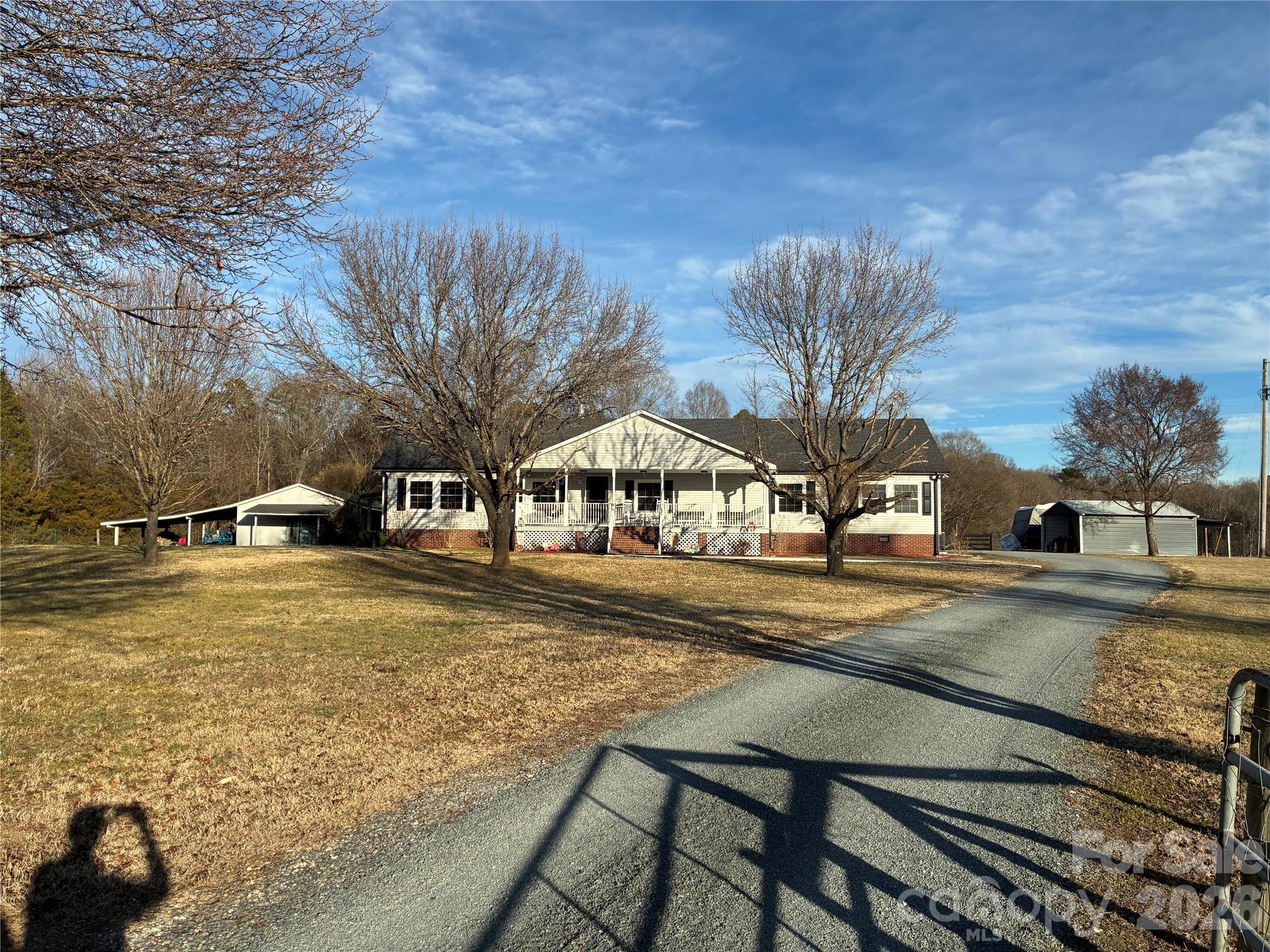 13215 Pine Bluff Road Midland, NC 28107 - Photo 1 of 48 a view of a house with a yard