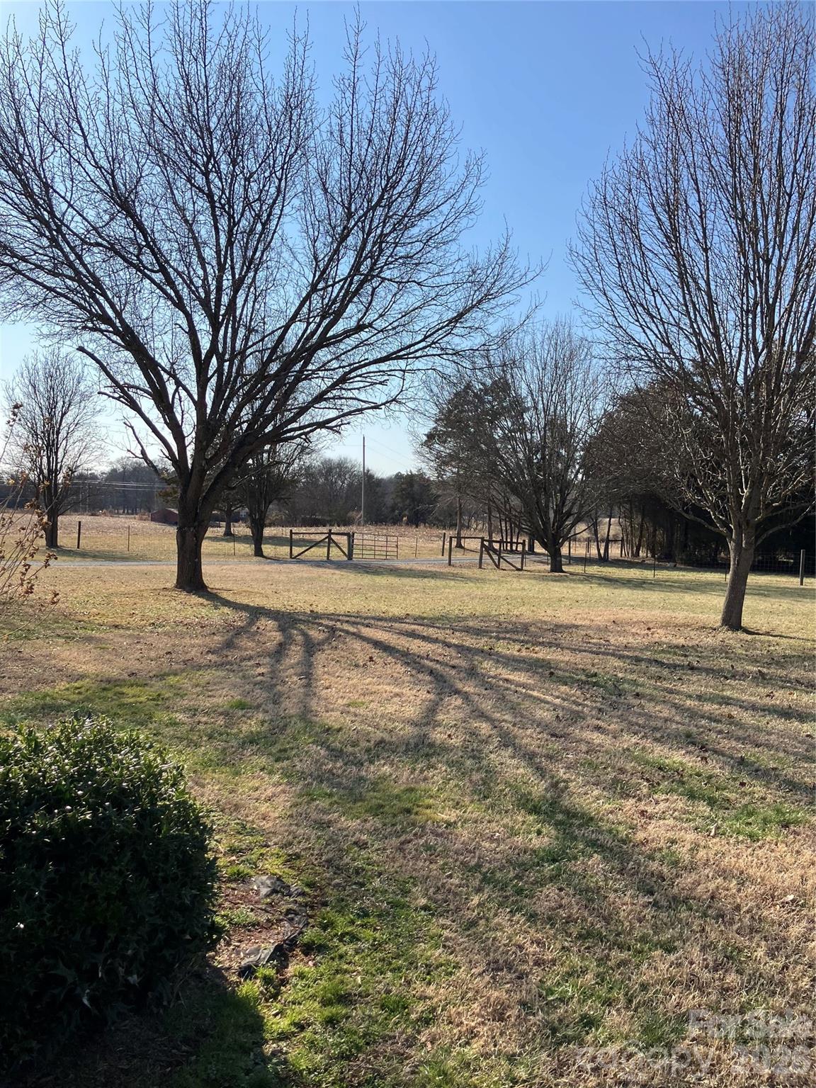 13215 Pine Bluff Road Midland, NC 28107 - Photo 11 of 48 a view of road with trees