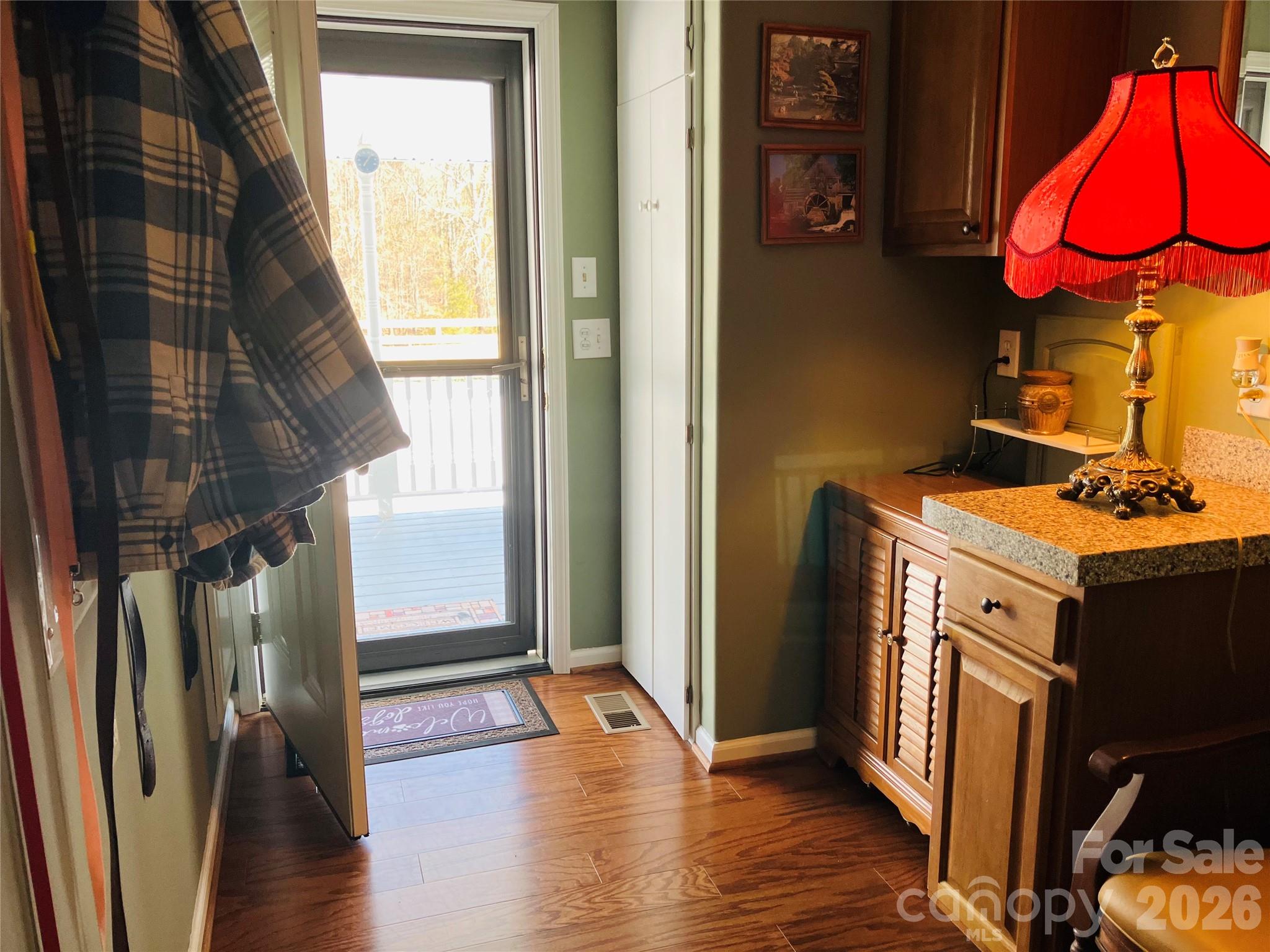 13215 Pine Bluff Road Midland, NC 28107 - Photo 21 of 46 a view of a room with wooden floor and door