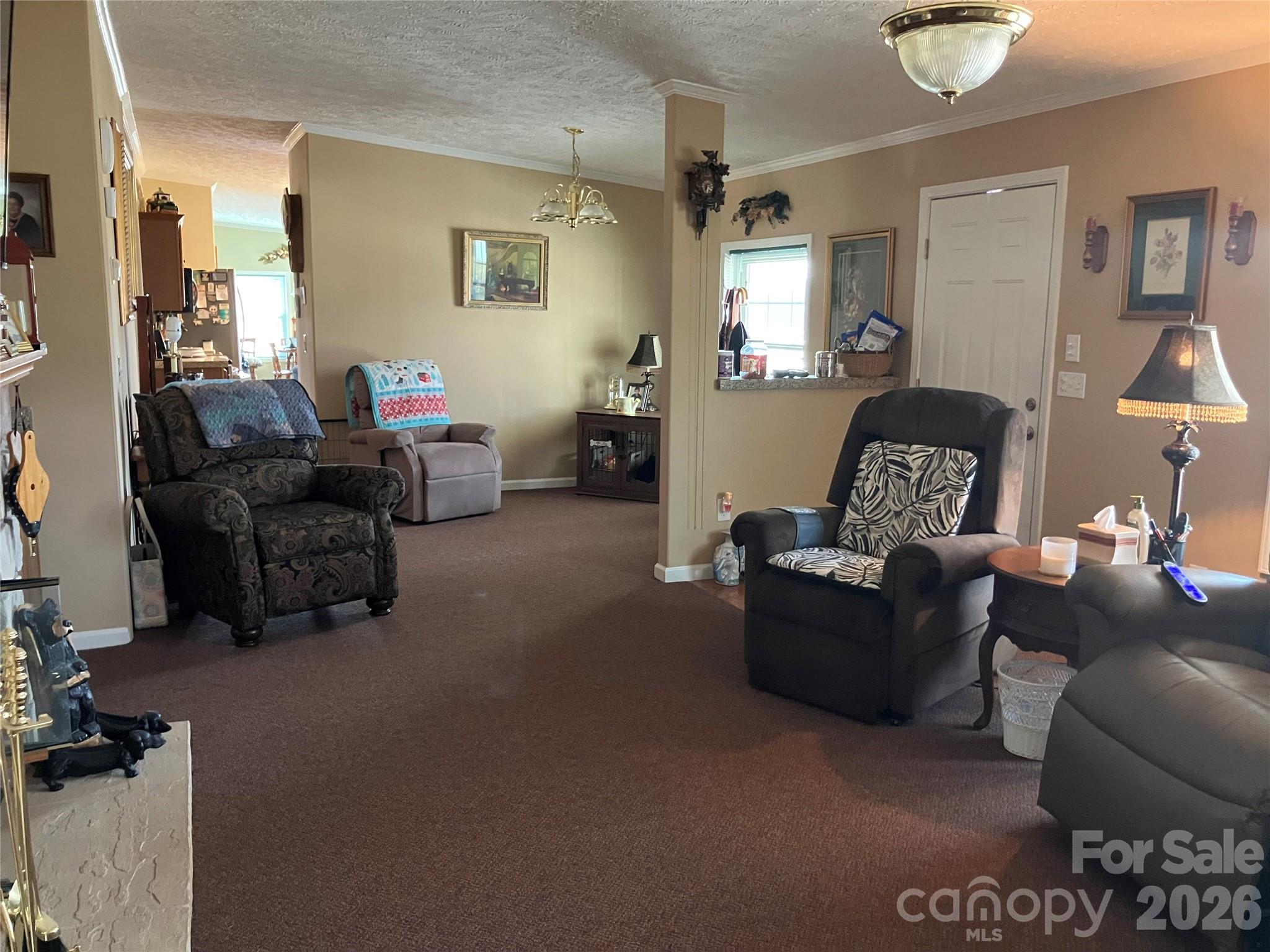 13215 Pine Bluff Road Midland, NC 28107 - Photo 24 of 48 a living room with furniture and a window