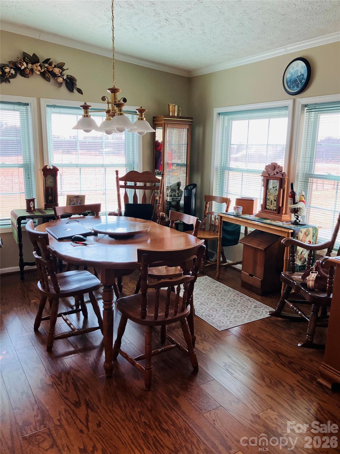 13215 Pine Bluff Road Midland, NC 28107 - Photo 29 of 46 a view of a dining room with furniture window and wooden floor