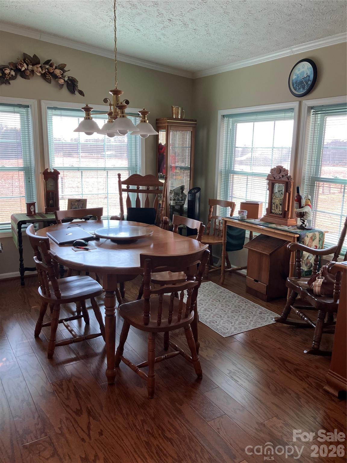 13215 Pine Bluff Road Midland, NC 28107 - Photo 31 of 48 a view of a dining room with furniture window and wooden floor