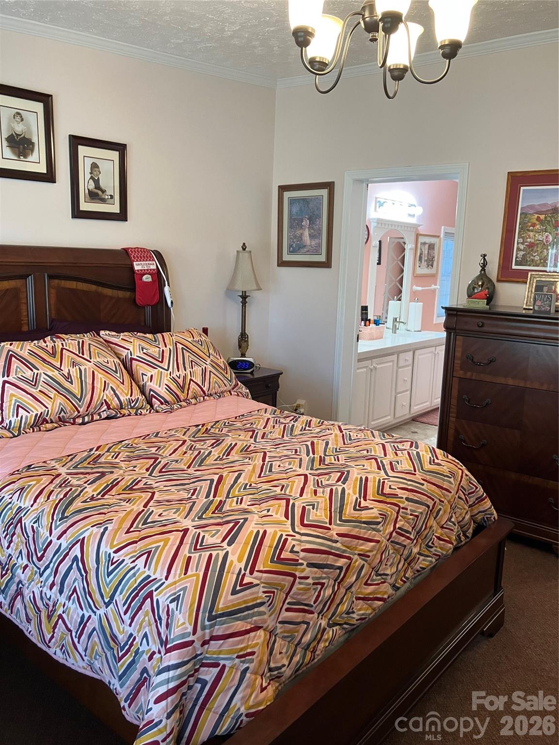 13215 Pine Bluff Road Midland, NC 28107 - Photo 32 of 48 a bedroom with a bed and dresser