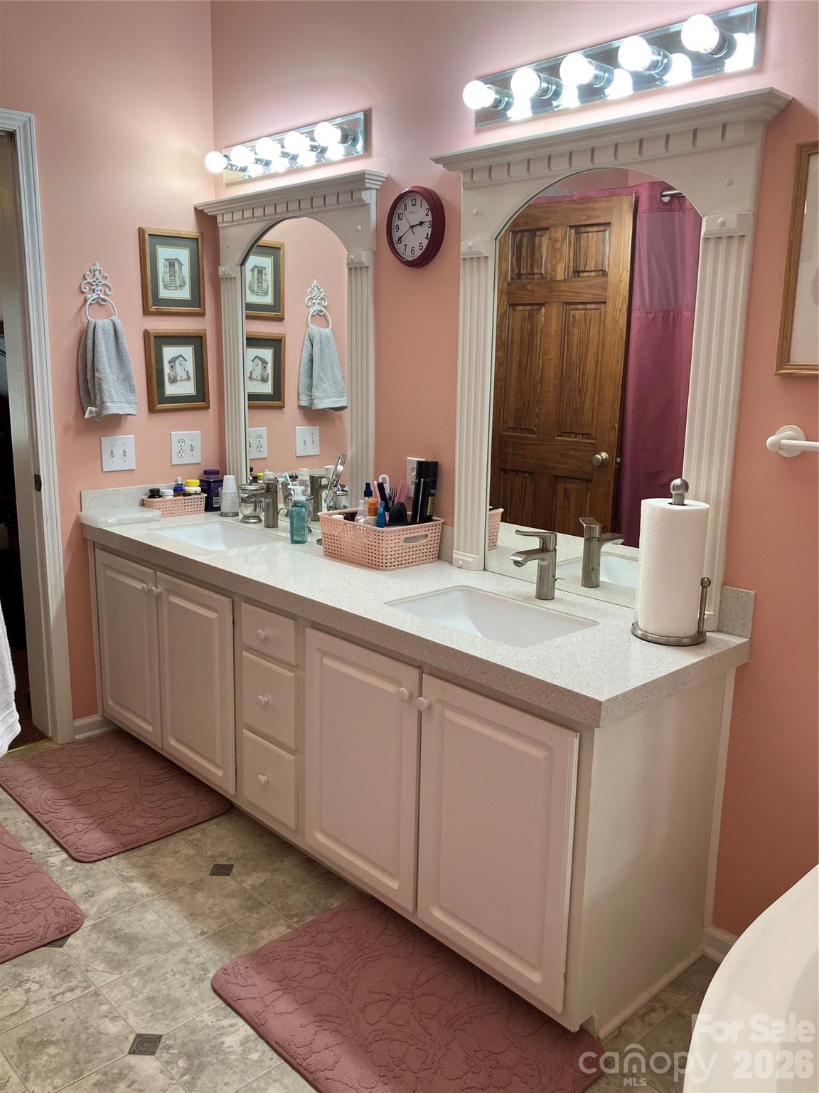 13215 Pine Bluff Road Midland, NC 28107 - Photo 40 of 48 a bathroom with a double vanity sink and a mirror