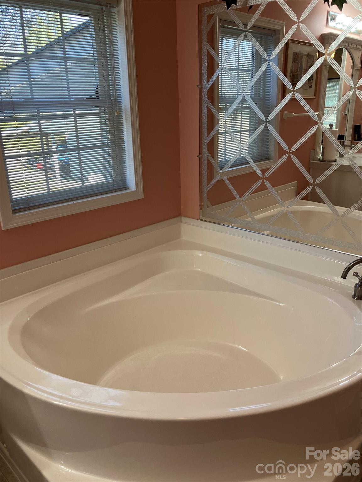 13215 Pine Bluff Road Midland, NC 28107 - Photo 41 of 48 a bath tub sitting next to a window