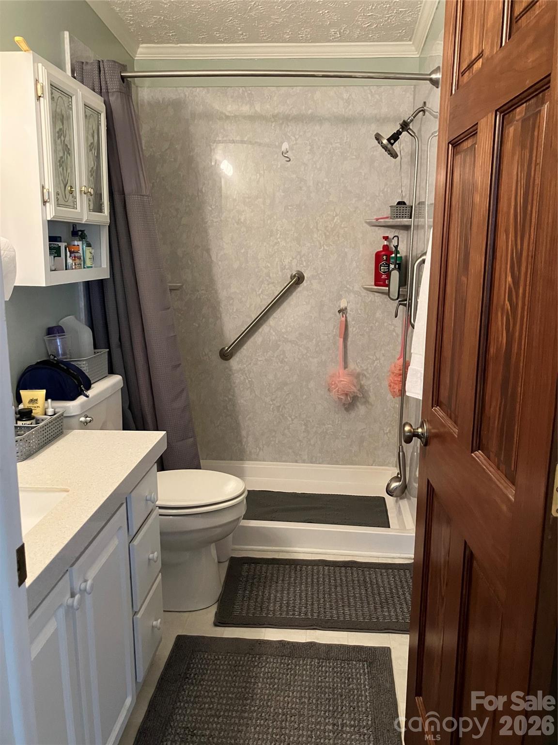 13215 Pine Bluff Road Midland, NC 28107 - Photo 43 of 48 a bathroom with a sink toilet and shower