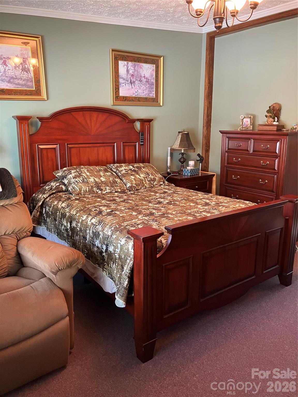 13215 Pine Bluff Road Midland, NC 28107 - Photo 46 of 48 a bedroom with a bed and dresser