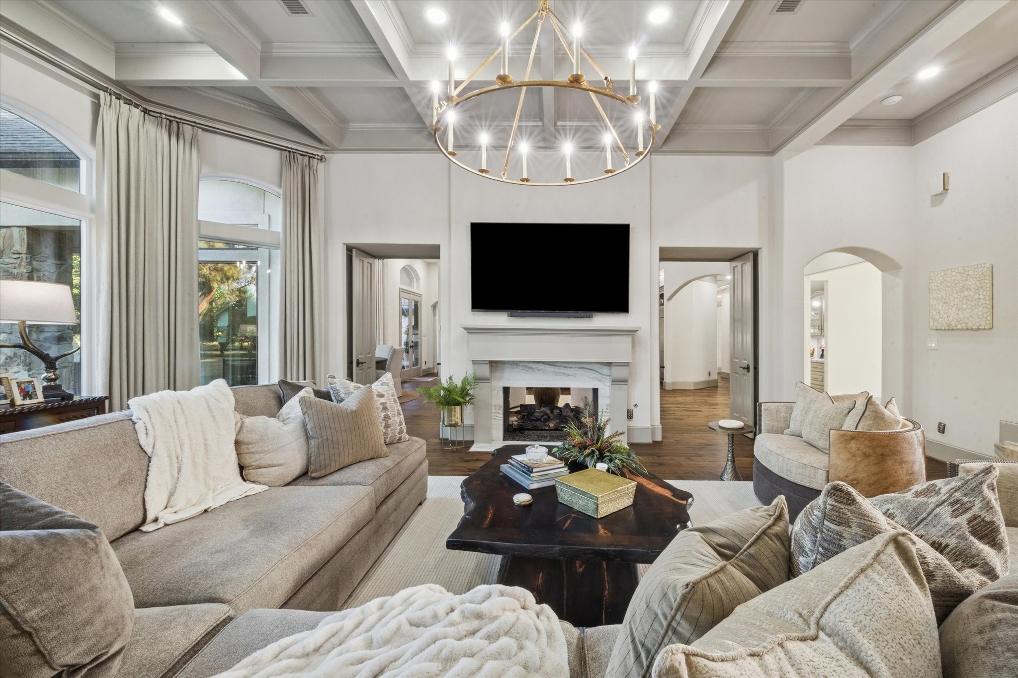 6602 Riva Ridge Drive Richmond, TX 77406 - Photo 11 of 50 a living room with furniture a fireplace and a flat screen tv