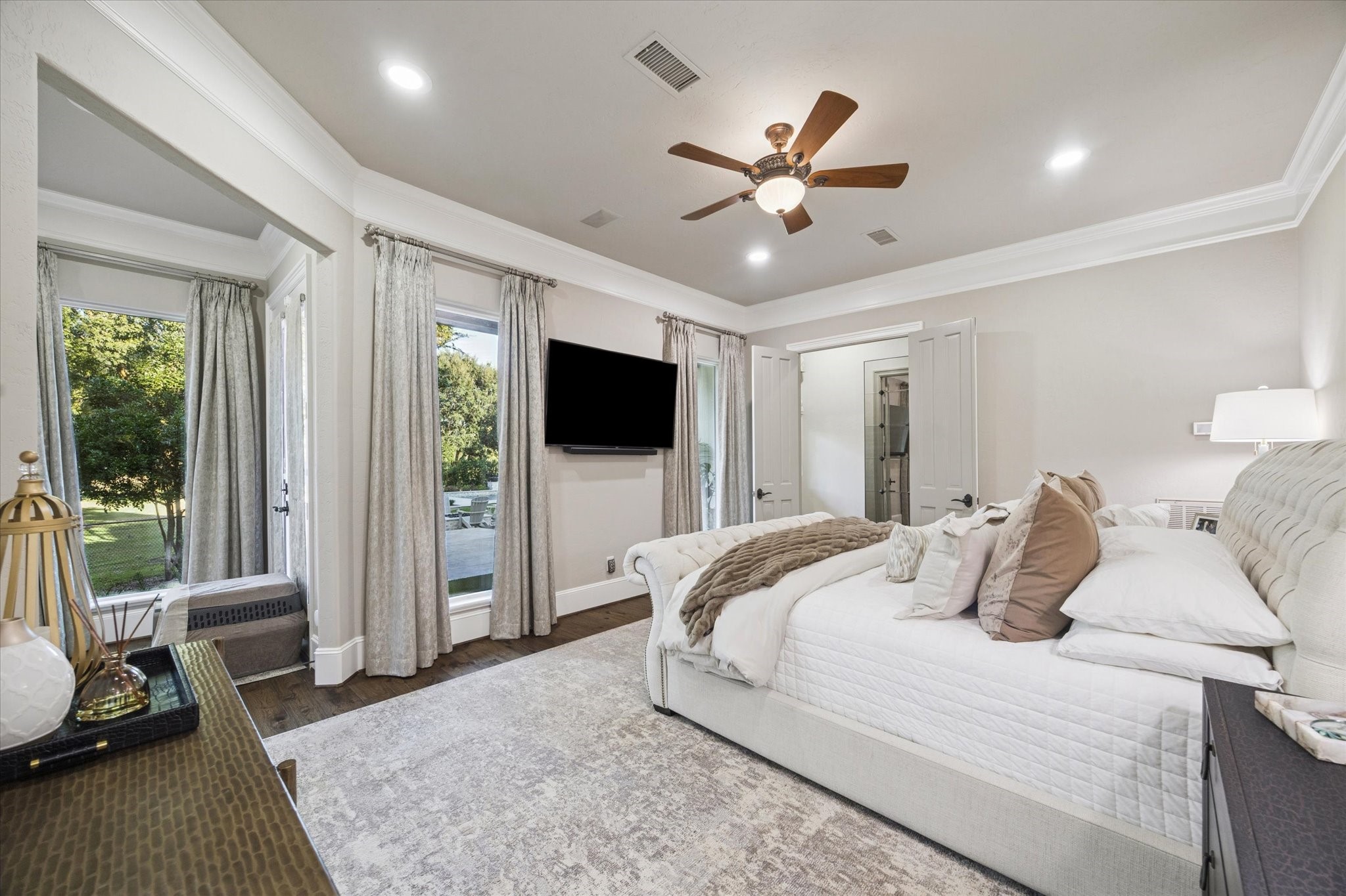 6602 Riva Ridge Drive Richmond, TX 77406 - Photo 19 of 50 a bedroom with a bed and a flat screen tv