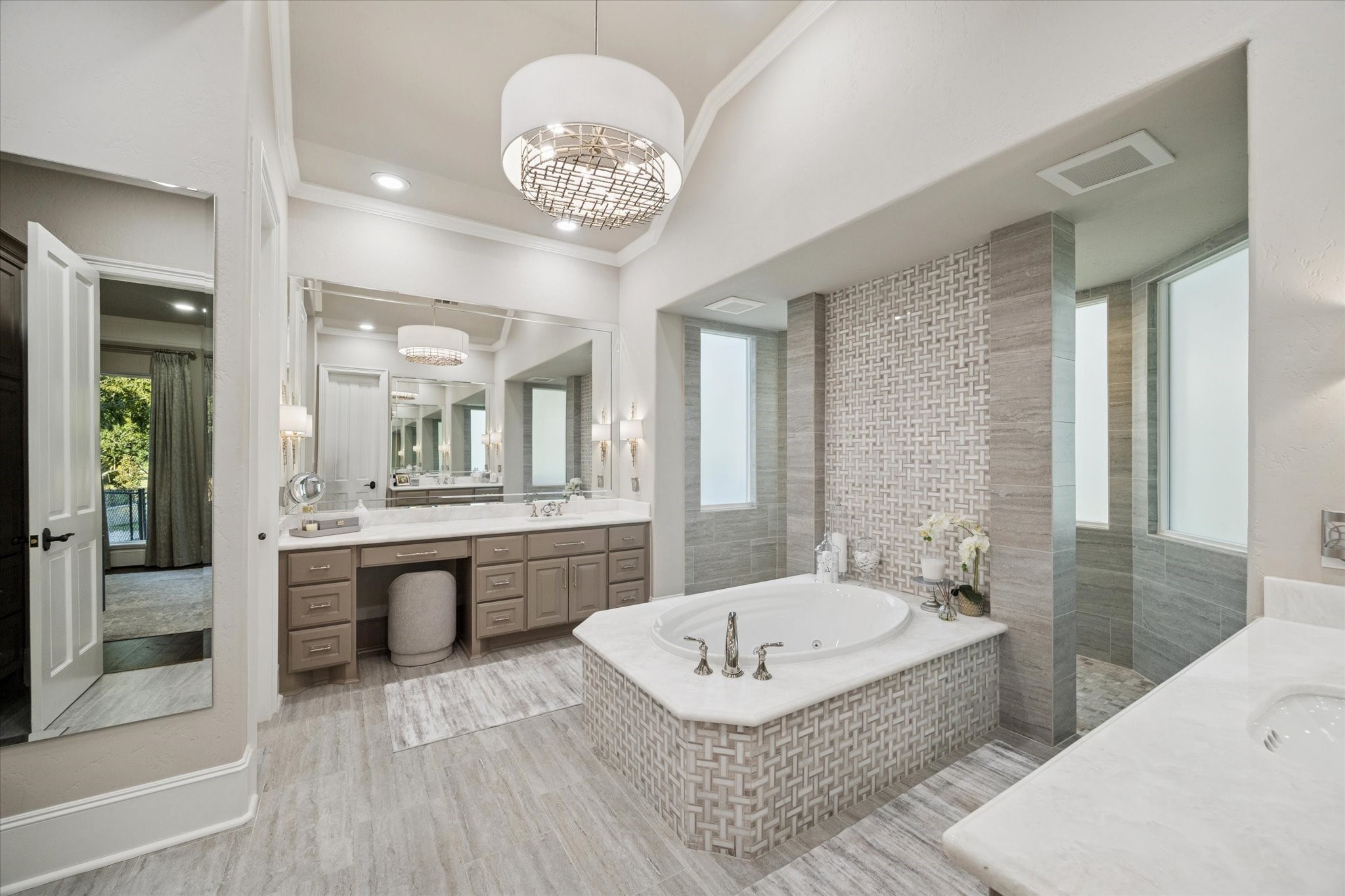6602 Riva Ridge Drive Richmond, TX 77406 - Photo 21 of 50 a spacious bathroom with a granite countertop tub sink and mirror