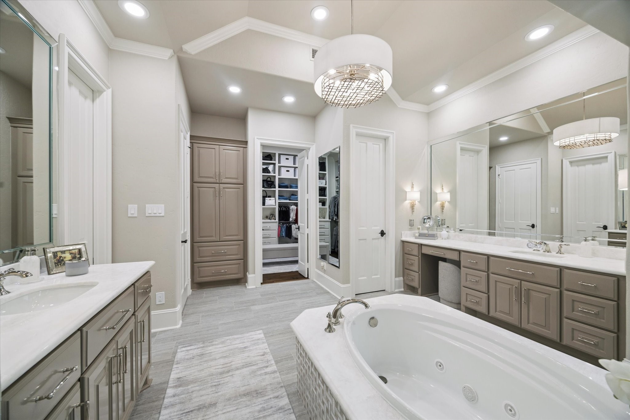 6602 Riva Ridge Drive Richmond, TX 77406 - Photo 23 of 50 a spacious bathroom with a tub sink shower and view kitchen