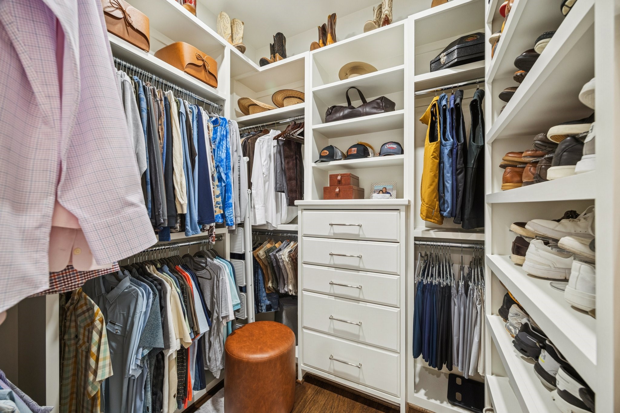 6602 Riva Ridge Drive Richmond, TX 77406 - Photo 25 of 50 a view of walk in closet with clothes and shoes