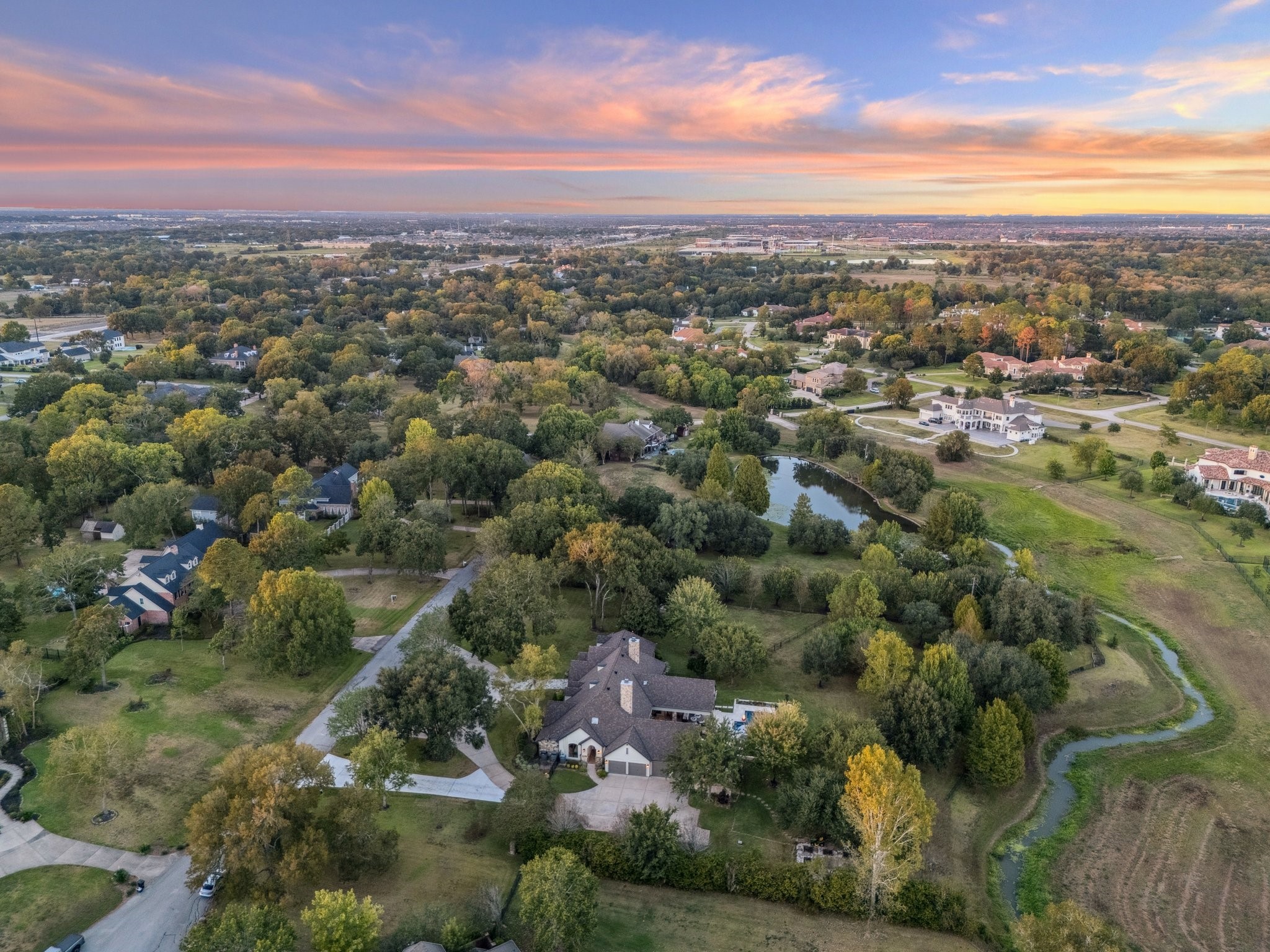 6602 Riva Ridge Drive Richmond, TX 77406 - Photo 27 of 50 an aerial view of a city with lots of residential buildings