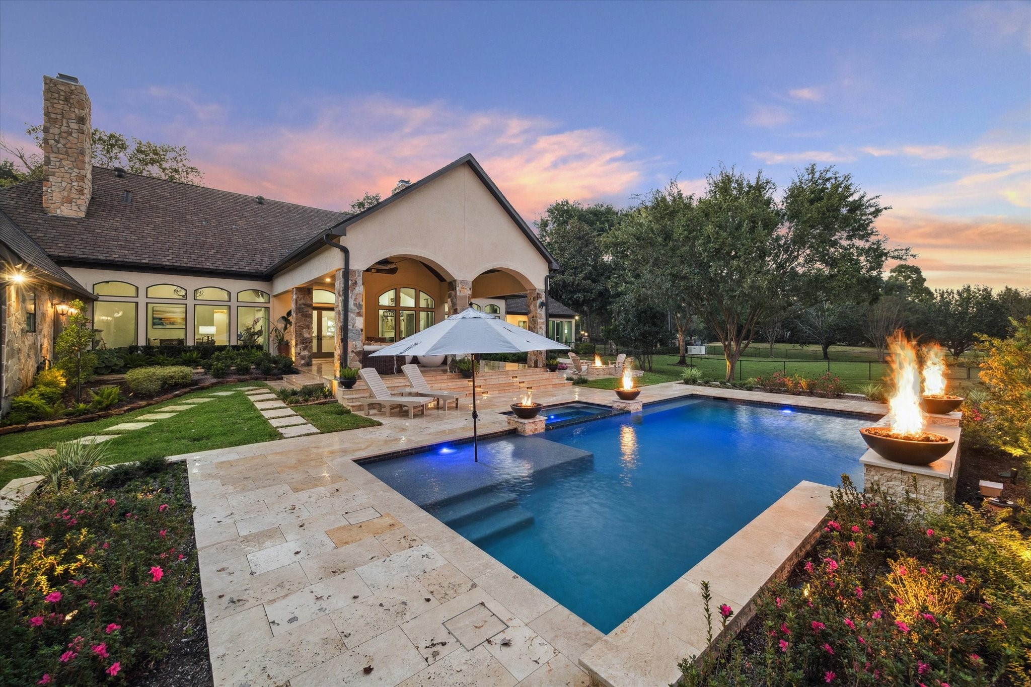 6602 Riva Ridge Drive Richmond, TX 77406 - Photo 29 of 50 a view of a house with pool and chairs