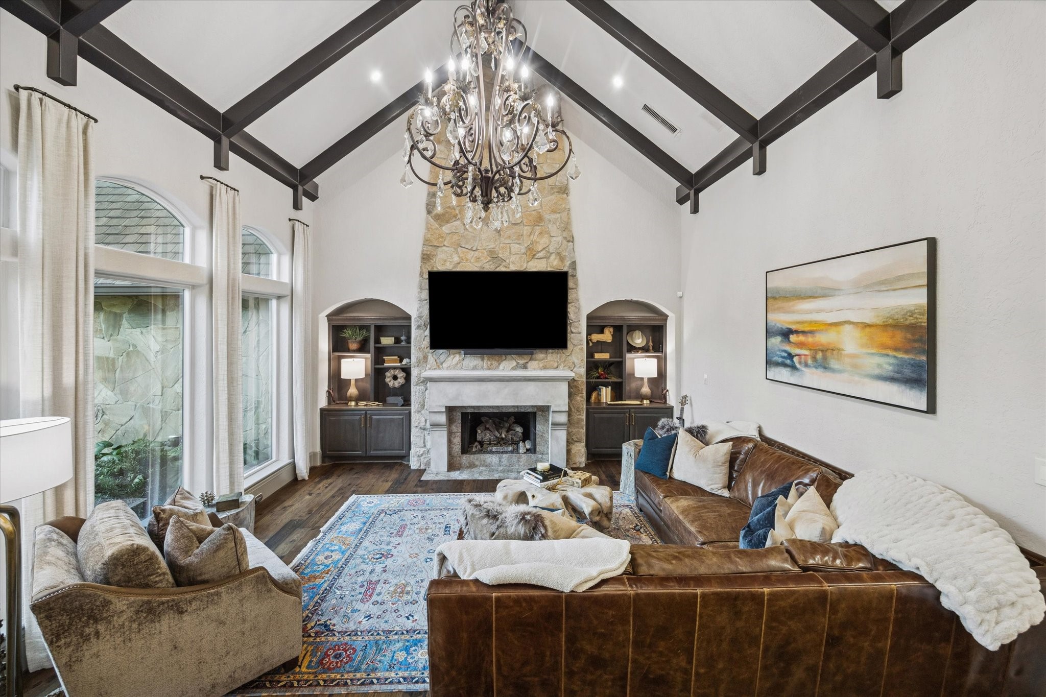 6602 Riva Ridge Drive Richmond, TX 77406 - Photo 4 of 50 a living room with furniture a fireplace and a flat screen tv
