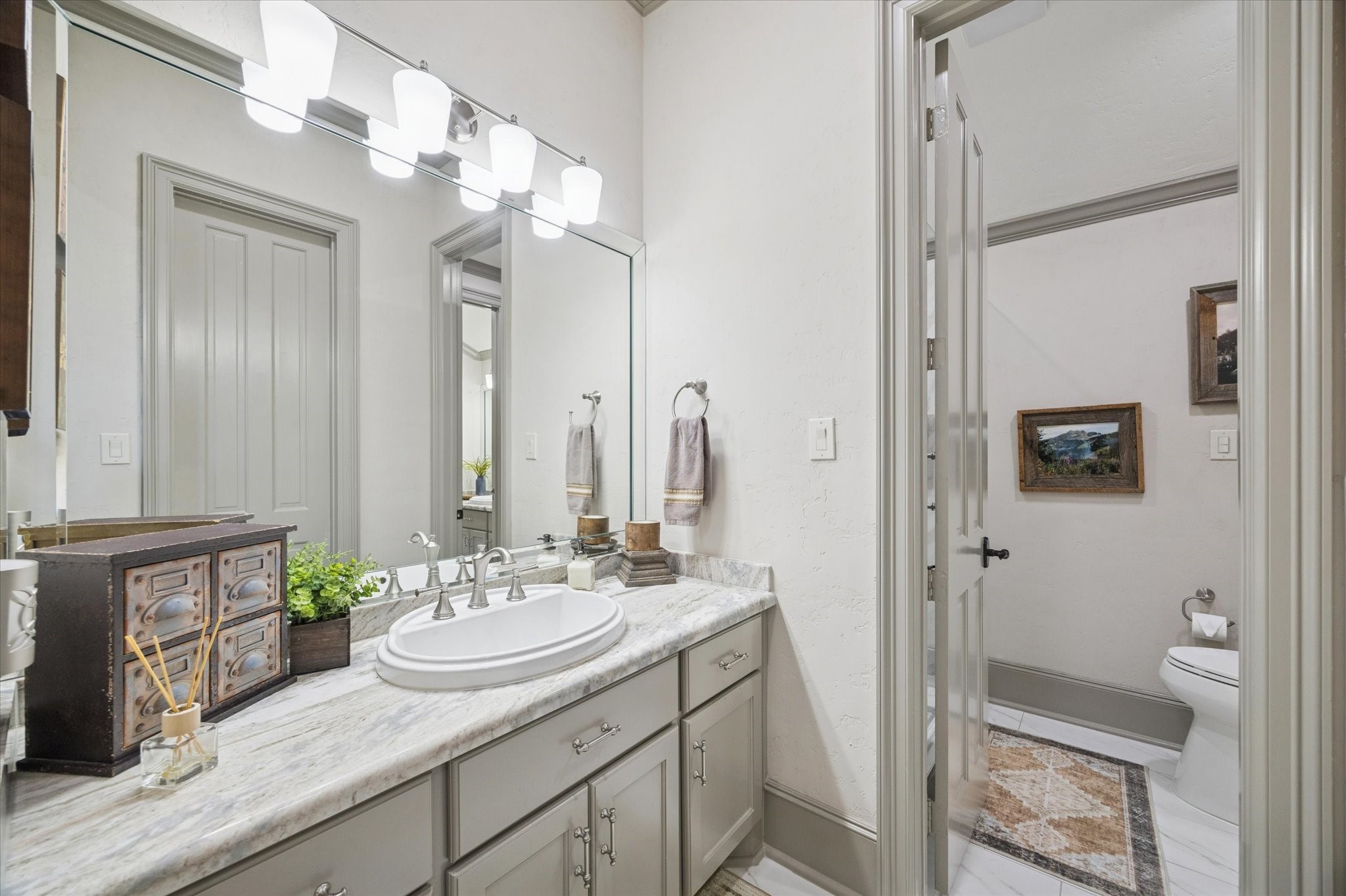 6602 Riva Ridge Drive Richmond, TX 77406 - Photo 42 of 50 a bathroom with a sink a toilet and shower