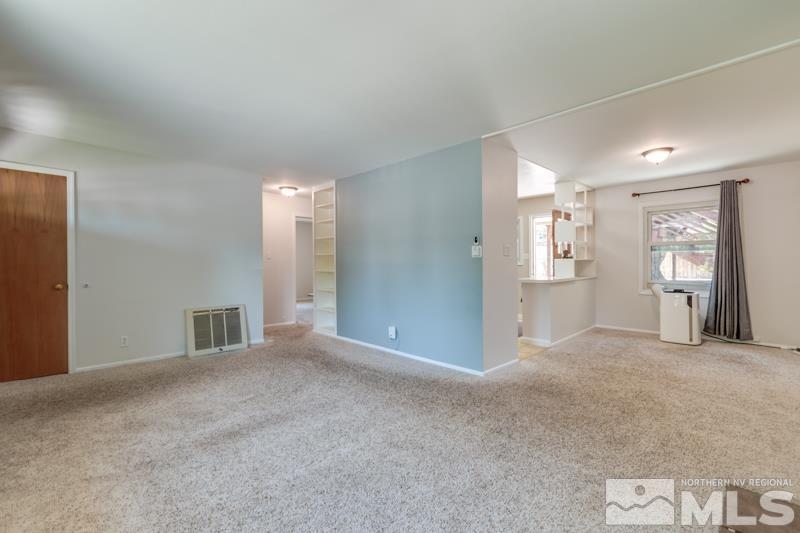 805 Reeves Avenue Reno, NV 89503 - Photo 6 of 21 a view of an empty room with windows and bathroom
