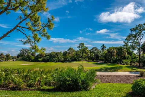 a view of a golf course with a garden