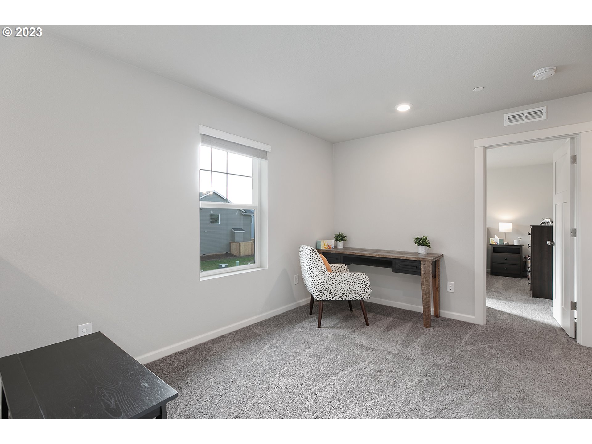 6732 North 89th Loop Camas, WA 98607 - Photo 16 of 41 a room with furniture and a window