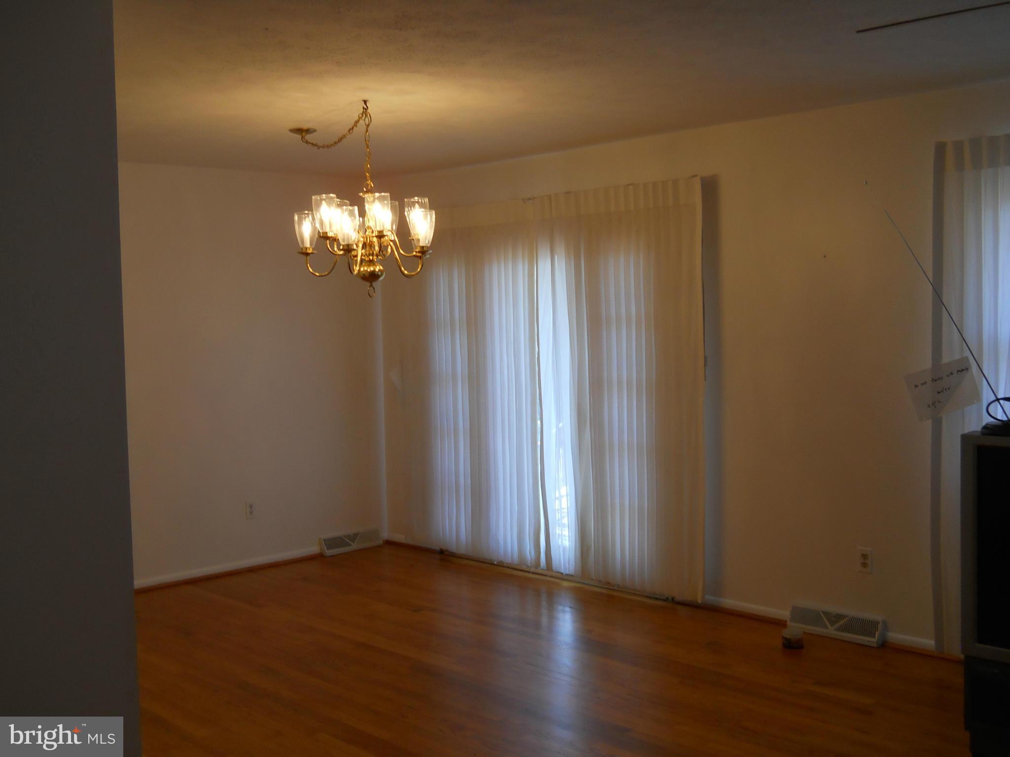 3604 Bellmore Road Baltimore, MD 21244 - Photo 12 of 19 a view of a chandelier in a room