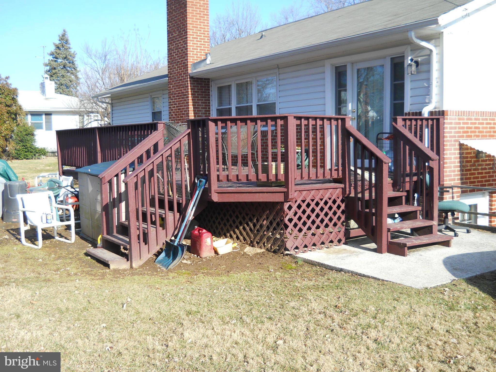 3604 Bellmore Road Baltimore, MD 21244 - Photo 14 of 19 a view of stairs and wooden fence