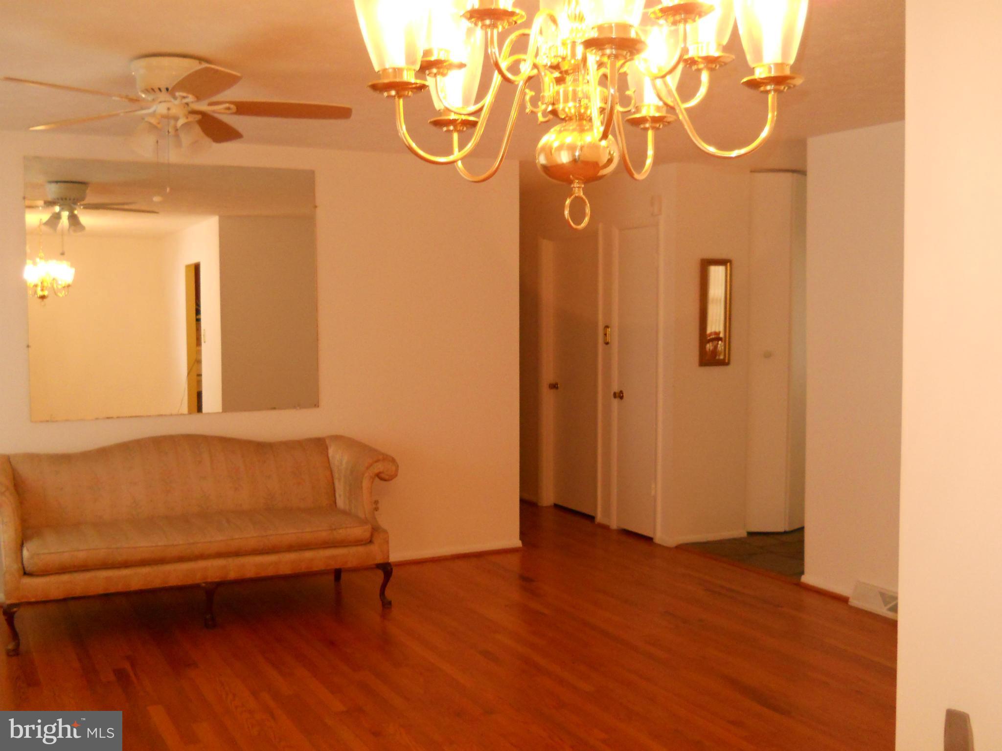 3604 Bellmore Road Baltimore, MD 21244 - Photo 5 of 19 a bathroom with a tub and a shower
