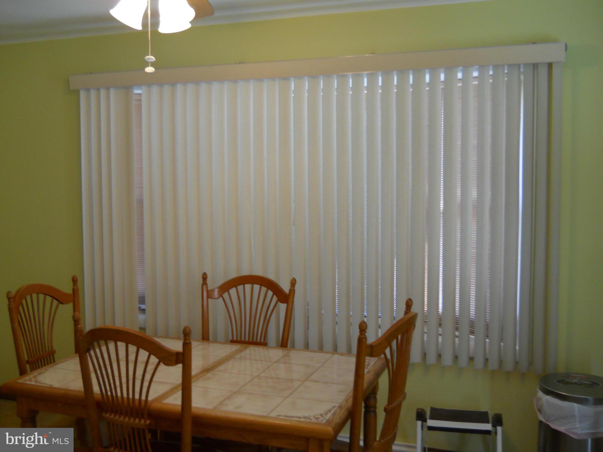 3604 Bellmore Road Baltimore, MD 21244 - Photo 6 of 19 a view of a room with furniture and wooden floor