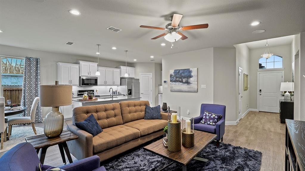 15540 Balham Path Fort Worth, TX 76247 - Photo 13 of 40 a living room with furniture