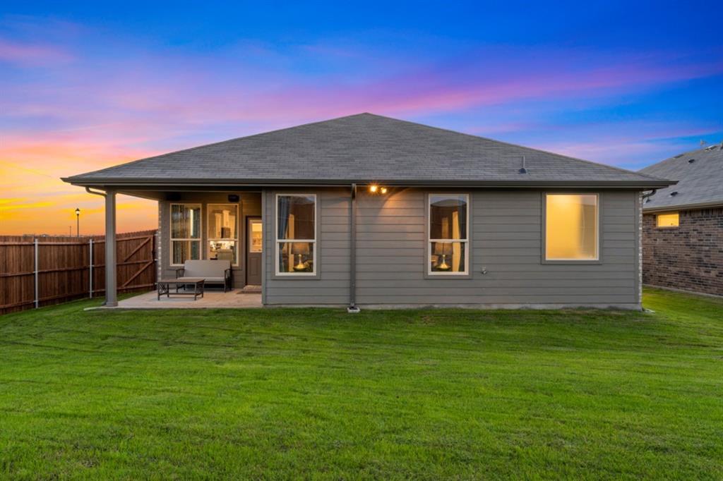 15540 Balham Path Fort Worth, TX 76247 - Photo 28 of 40 a view of a house with a yard
