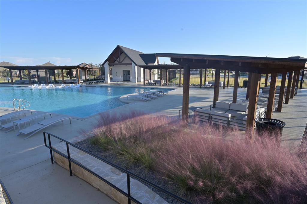 15540 Balham Path Fort Worth, TX 76247 - Photo 31 of 40 a view of a house with backyard and sitting area