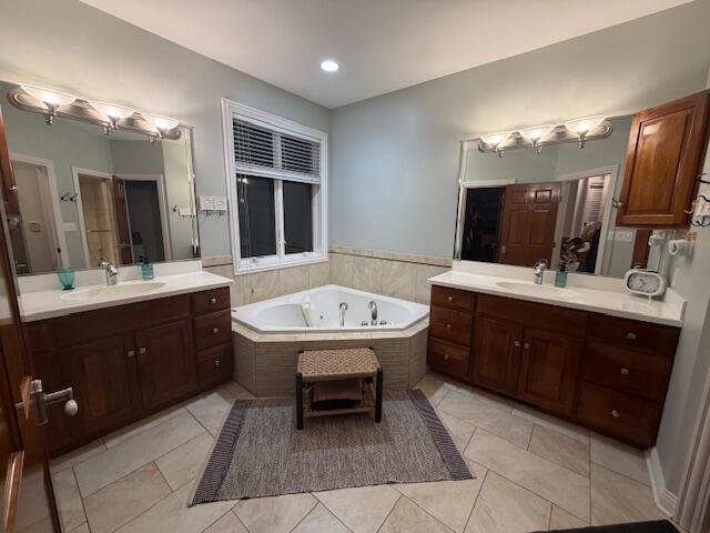 9261 Ruth Court St. John, IN 46373 - Photo 22 of 48 a spacious bathroom with a tub double sink and two mirror