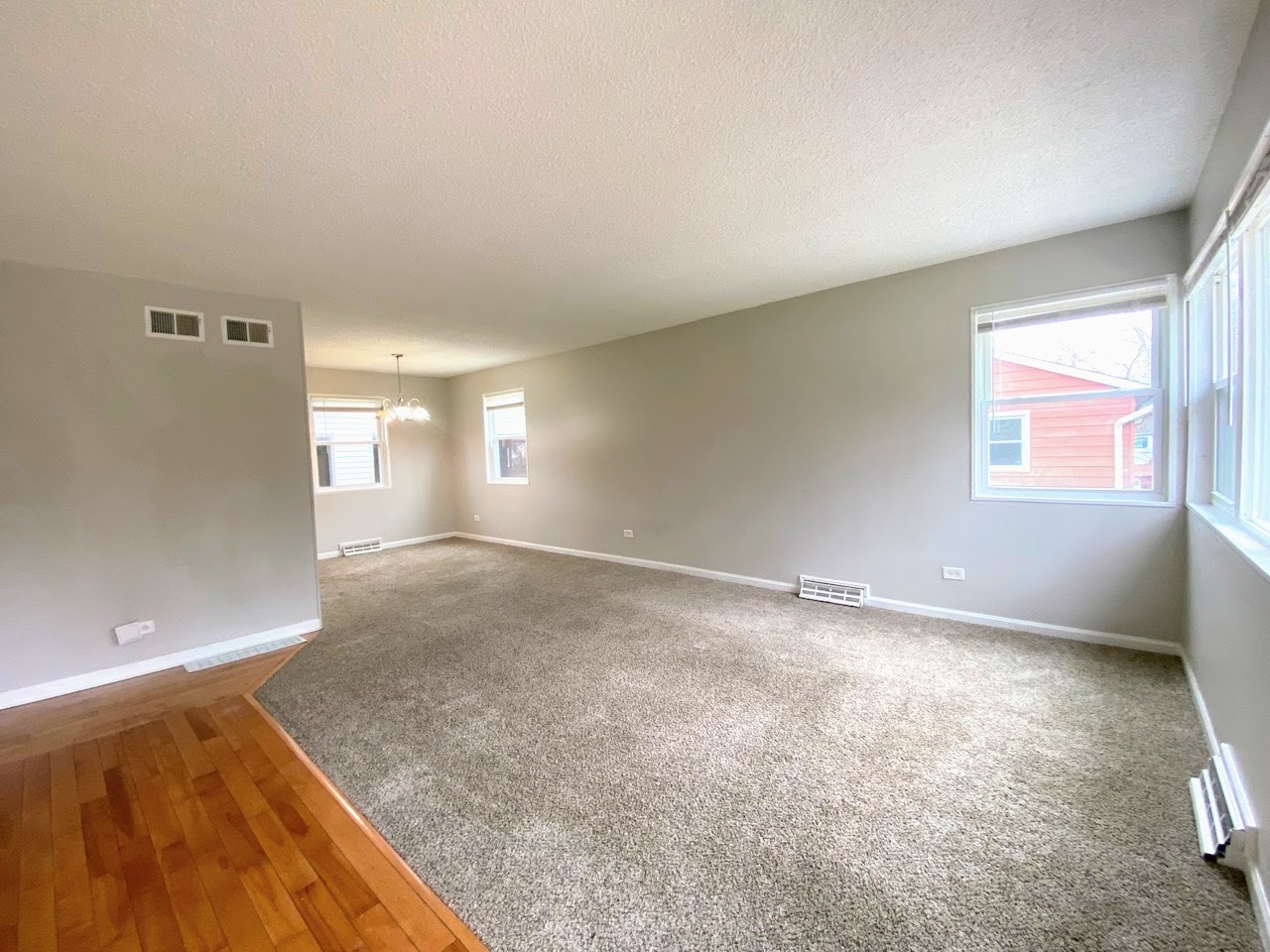 23922 South Cretewood Lane Crete, IL 60417 - Photo 2 of 18 an empty room with windows