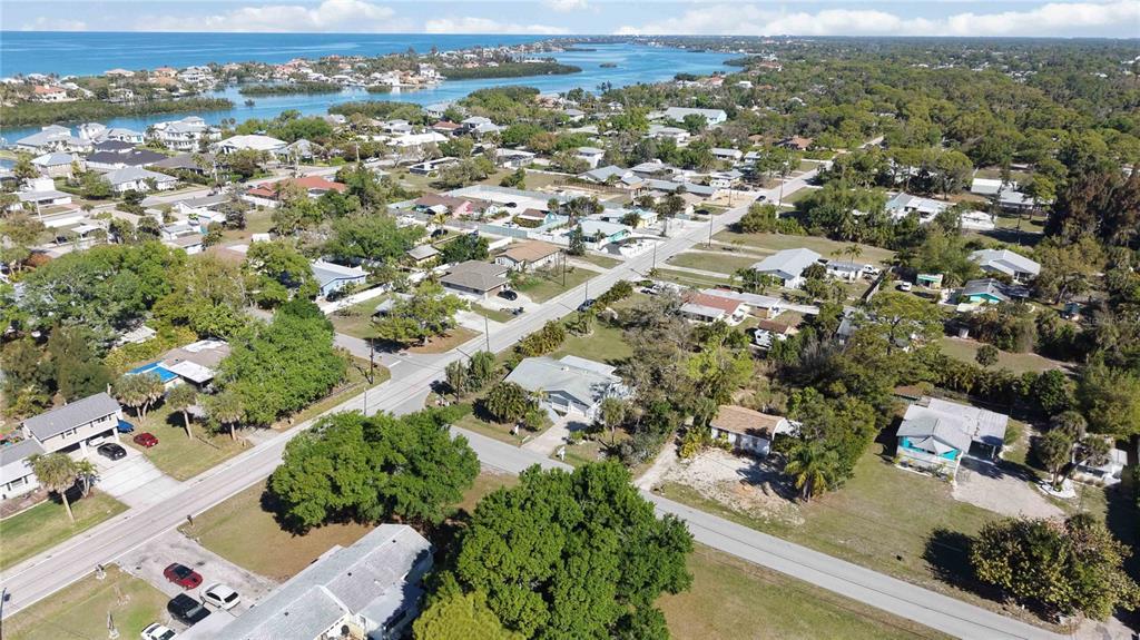 840 Channel Acres Road Nokomis, FL 34275 - Photo 41 of 48 an aerial view of a city with lots of residential buildings