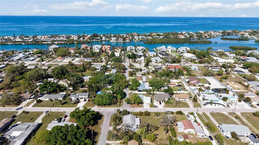840 Channel Acres Road Nokomis, FL 34275 - Photo 42 of 48 an aerial view of residential building with parking space