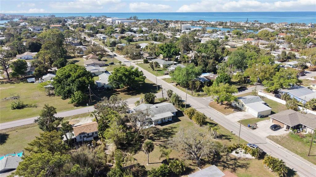 840 Channel Acres Road Nokomis, FL 34275 - Photo 45 of 48 an aerial view of residential houses with outdoor space