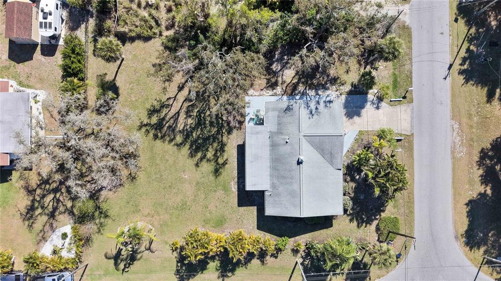 840 Channel Acres Road Nokomis, FL 34275 - Photo 48 of 48 an aerial view of a house with a yard