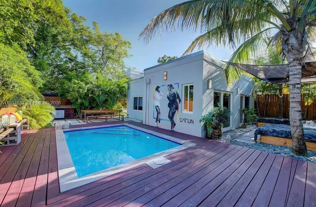 a view of outdoor space yard deck patio and swimming pool