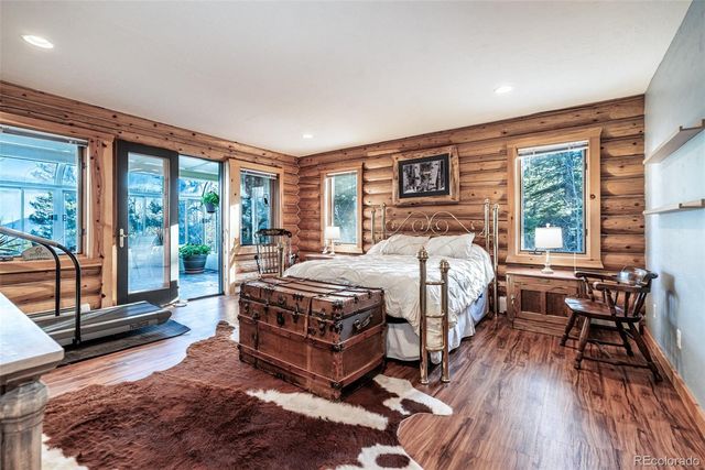 a bed room with a bed and a table