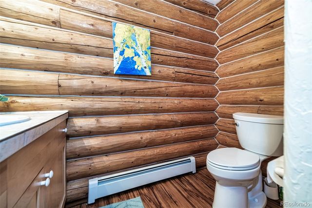 a bathroom with a toilet and a sink